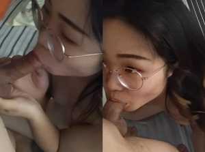  The bespectacled girl practices sucking cock